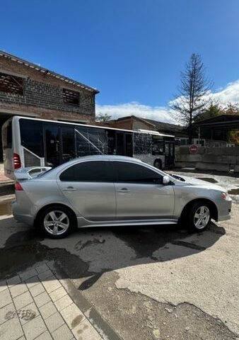 Сірий Міцубісі Lancer, об'ємом двигуна 2 л та пробігом 199 тис. км за 6850 $, фото 10 на Automoto.ua