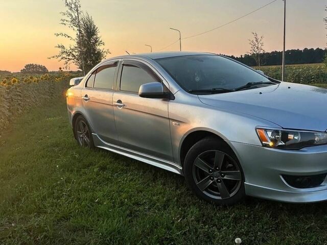 Сірий Міцубісі Lancer, об'ємом двигуна 2 л та пробігом 253 тис. км за 6900 $, фото 5 на Automoto.ua
