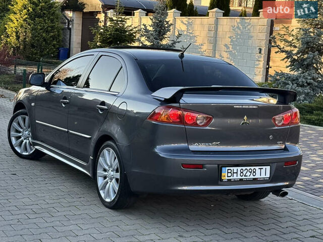 Сірий Міцубісі Lancer, об'ємом двигуна 2 л та пробігом 92 тис. км за 9800 $, фото 26 на Automoto.ua
