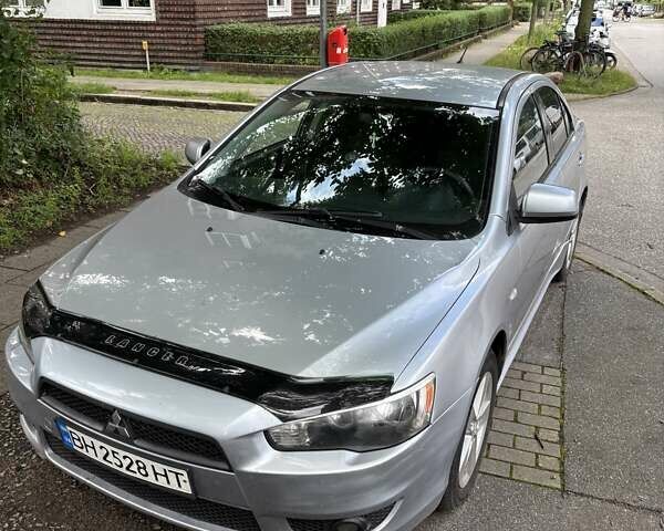 Серый Мицубиси Лансер, объемом двигателя 2 л и пробегом 183 тыс. км за 7500 $, фото 4 на Automoto.ua