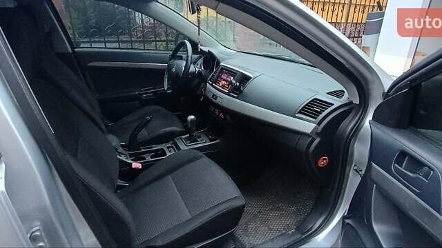 Серый Мицубиси Лансер, объемом двигателя 1.5 л и пробегом 230 тыс. км за 6300 $, фото 13 на Automoto.ua