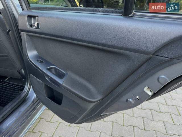 Сірий Міцубісі Lancer, об'ємом двигуна 2 л та пробігом 92 тис. км за 9800 $, фото 74 на Automoto.ua