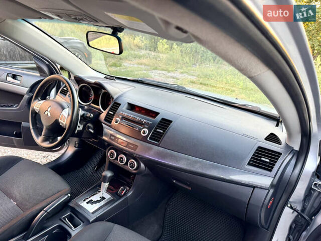 Сірий Міцубісі Lancer, об'ємом двигуна 2 л та пробігом 223 тис. км за 7390 $, фото 18 на Automoto.ua