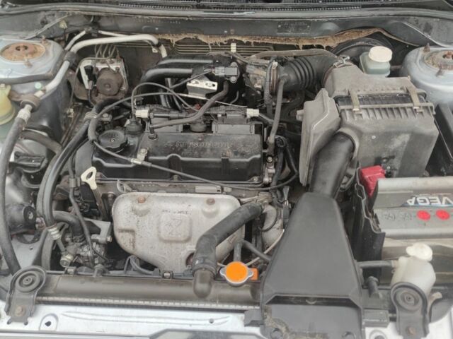 Серый Мицубиси Лансер, объемом двигателя 1.6 л и пробегом 225 тыс. км за 3100 $, фото 8 на Automoto.ua