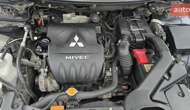 Сірий Міцубісі Lancer, об'ємом двигуна 1.5 л та пробігом 200 тис. км за 6400 $, фото 17 на Automoto.ua