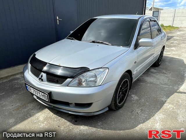 Сірий Міцубісі Lancer, об'ємом двигуна 1.6 л та пробігом 193 тис. км за 4500 $, фото 1 на Automoto.ua