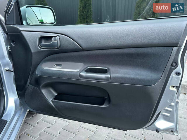 Серый Мицубиси Лансер, объемом двигателя 1.58 л и пробегом 34 тыс. км за 7500 $, фото 39 на Automoto.ua