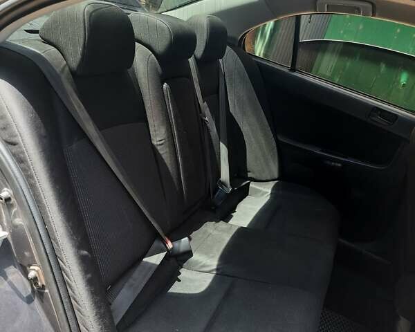 Сірий Міцубісі Lancer, об'ємом двигуна 1.5 л та пробігом 202 тис. км за 5899 $, фото 15 на Automoto.ua