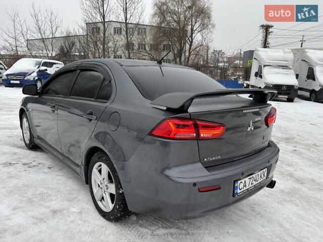 Серый Мицубиси Лансер, объемом двигателя 2 л и пробегом 163 тыс. км за 7500 $, фото 6 на Automoto.ua
