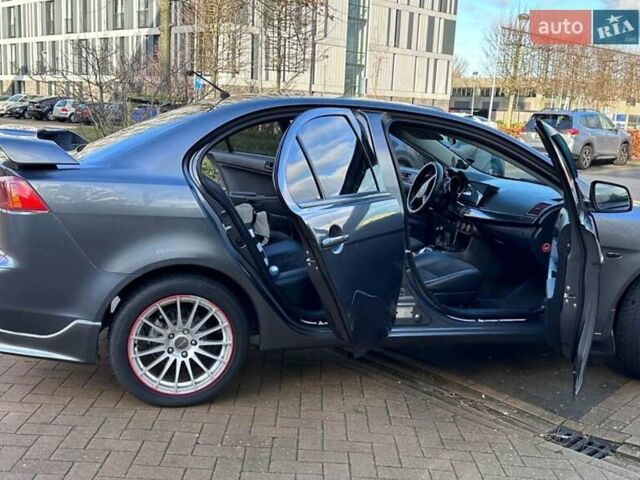 Сірий Міцубісі Lancer, об'ємом двигуна 1.5 л та пробігом 200 тис. км за 6400 $, фото 4 на Automoto.ua