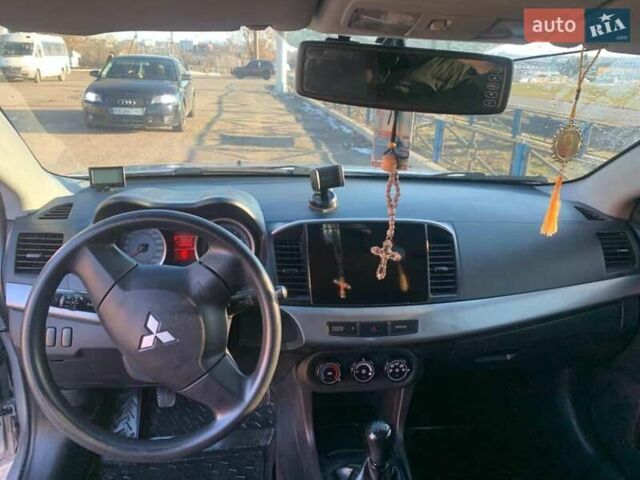 Серый Мицубиси Лансер, объемом двигателя 1.5 л и пробегом 160 тыс. км за 5300 $, фото 1 на Automoto.ua