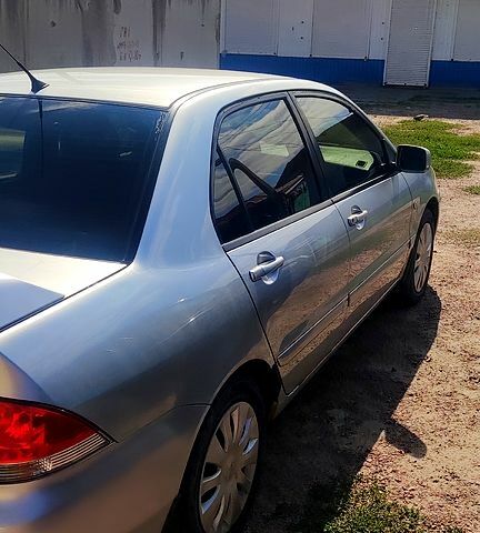Сірий Міцубісі Lancer, об'ємом двигуна 1.6 л та пробігом 212 тис. км за 4000 $, фото 1 на Automoto.ua