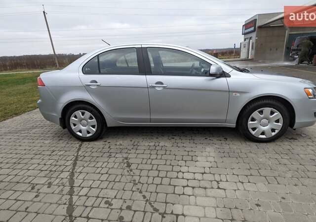 Серый Мицубиси Лансер, объемом двигателя 1.5 л и пробегом 147 тыс. км за 6700 $, фото 6 на Automoto.ua