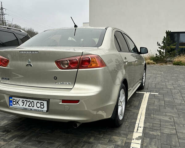 Сірий Міцубісі Lancer, об'ємом двигуна 2 л та пробігом 230 тис. км за 6800 $, фото 10 на Automoto.ua