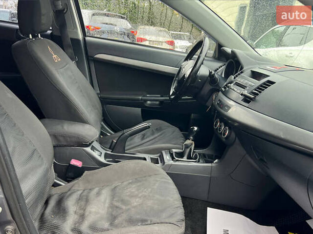 Серый Мицубиси Лансер, объемом двигателя 1.5 л и пробегом 239 тыс. км за 6000 $, фото 14 на Automoto.ua