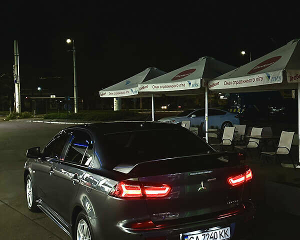 Серый Мицубиси Лансер, объемом двигателя 2 л и пробегом 153 тыс. км за 7500 $, фото 32 на Automoto.ua