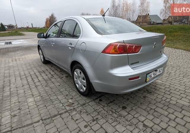 Серый Мицубиси Лансер, объемом двигателя 1.5 л и пробегом 147 тыс. км за 6700 $, фото 8 на Automoto.ua