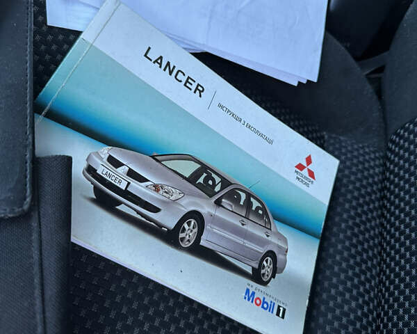 Сірий Міцубісі Lancer, об'ємом двигуна 1.6 л та пробігом 278 тис. км за 3999 $, фото 10 на Automoto.ua