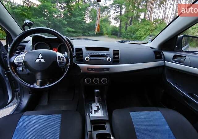 Міцубісі Lancer 2008 у Києві на Automoto.ua Сірий Міцубісі Lancer, об'ємом двигуна 2 л та пробігом 175 тис. км за 8200 $, фото 23 на Automoto.ua