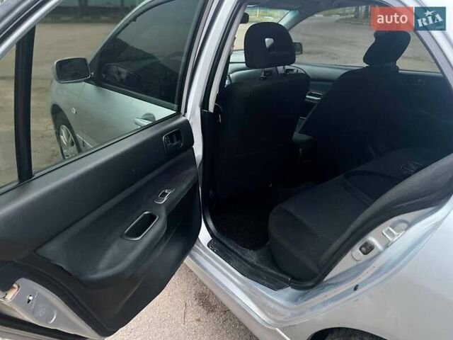 Сірий Міцубісі Lancer, об'ємом двигуна 1.6 л та пробігом 254 тис. км за 3800 $, фото 12 на Automoto.ua