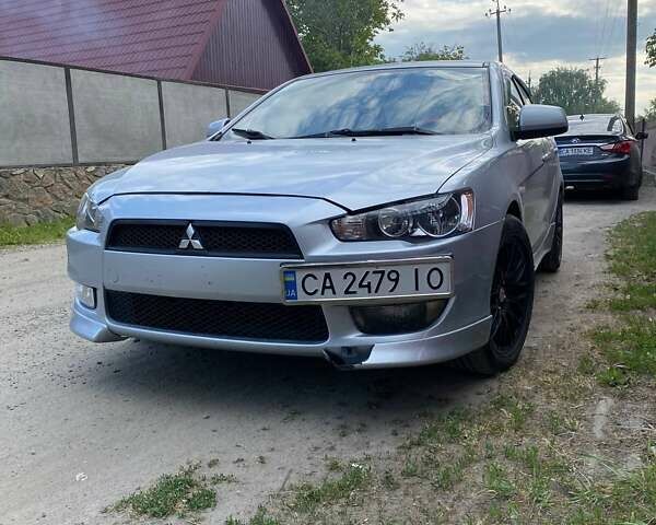 Сірий Міцубісі Lancer, об'ємом двигуна 2 л та пробігом 253 тис. км за 5800 $, фото 1 на Automoto.ua