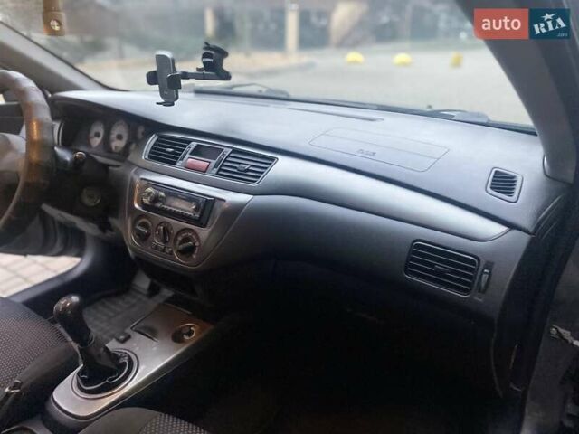 Сірий Міцубісі Lancer, об'ємом двигуна 1.6 л та пробігом 250 тис. км за 3500 $, фото 9 на Automoto.ua