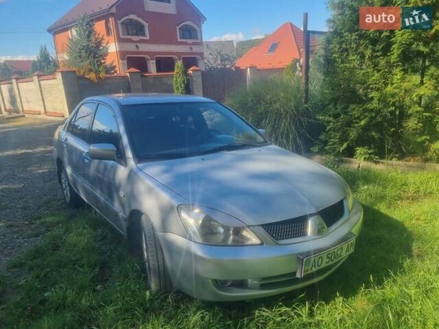 Сірий Міцубісі Lancer, об'ємом двигуна 1.6 л та пробігом 290 тис. км за 3850 $, фото 7 на Automoto.ua