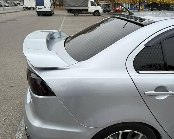 Сірий Міцубісі Lancer, об'ємом двигуна 2 л та пробігом 253 тис. км за 8700 $, фото 18 на Automoto.ua