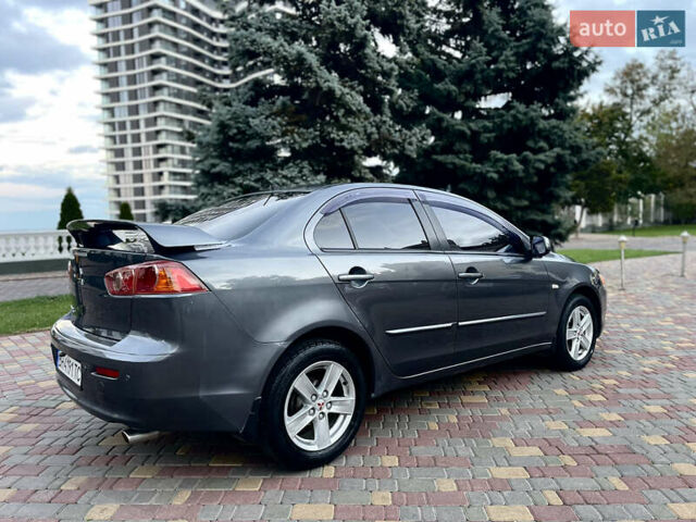 Серый Мицубиси Лансер, объемом двигателя 2 л и пробегом 212 тыс. км за 6000 $, фото 12 на Automoto.ua