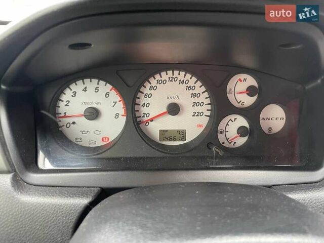 Серый Мицубиси Лансер, объемом двигателя 1.58 л и пробегом 146 тыс. км за 5490 $, фото 19 на Automoto.ua