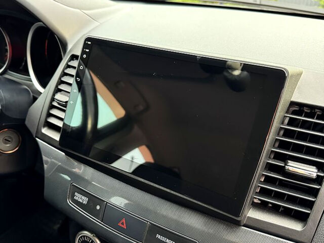 Сірий Міцубісі Lancer, об'ємом двигуна 2 л та пробігом 180 тис. км за 7600 $, фото 12 на Automoto.ua