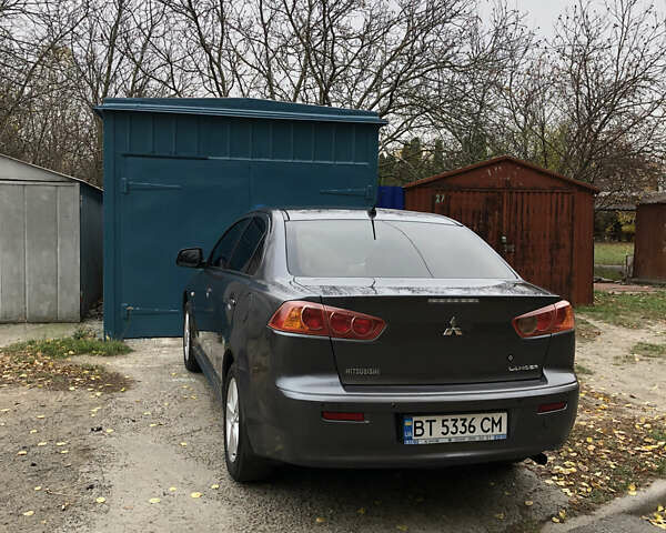Сірий Міцубісі Lancer, об'ємом двигуна 2 л та пробігом 187 тис. км за 8000 $, фото 8 на Automoto.ua