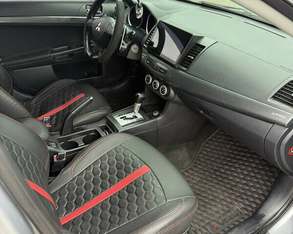 Сірий Міцубісі Lancer, об'ємом двигуна 2 л та пробігом 253 тис. км за 8700 $, фото 43 на Automoto.ua