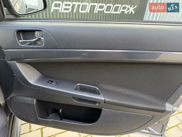 Серый Мицубиси Лансер, объемом двигателя 2 л и пробегом 230 тыс. км за 6900 $, фото 31 на Automoto.ua