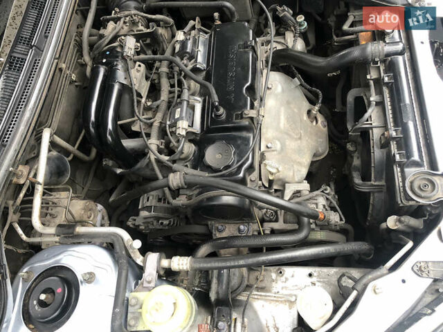 Сірий Міцубісі Lancer, об'ємом двигуна 1.58 л та пробігом 240 тис. км за 4299 $, фото 28 на Automoto.ua