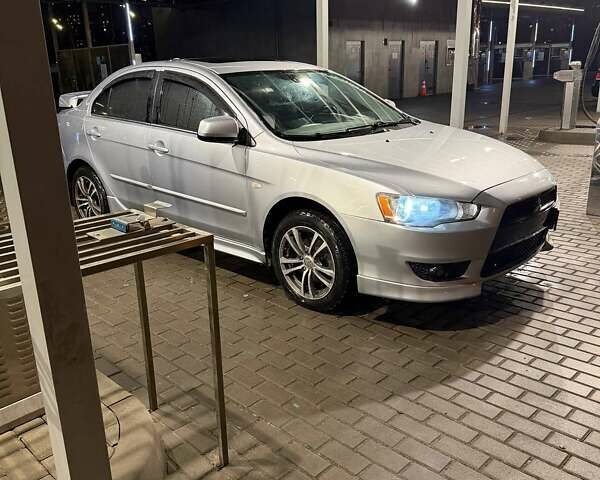 Серый Мицубиси Лансер, объемом двигателя 1.5 л и пробегом 306 тыс. км за 5750 $, фото 1 на Automoto.ua