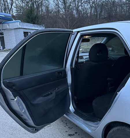 Сірий Міцубісі Lancer, об'ємом двигуна 1.58 л та пробігом 180 тис. км за 3900 $, фото 7 на Automoto.ua