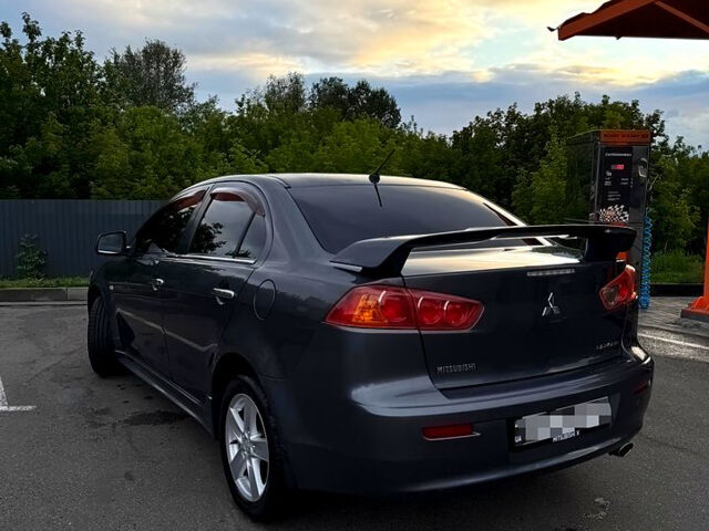 Сірий Міцубісі Lancer, об'ємом двигуна 2 л та пробігом 180 тис. км за 7600 $, фото 2 на Automoto.ua