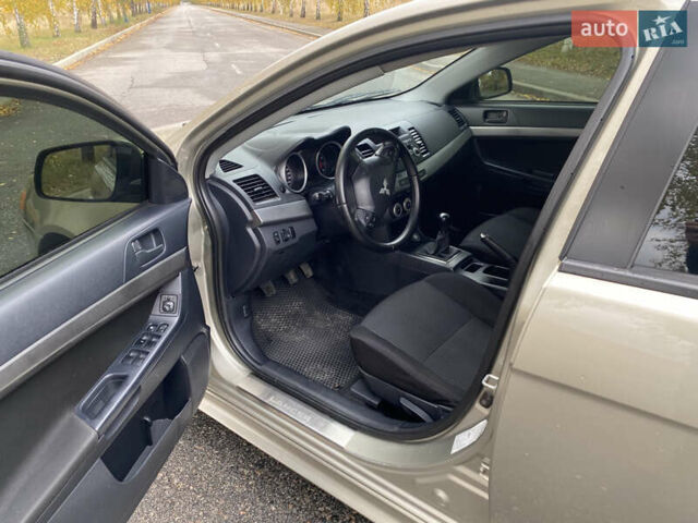 Мицубиси Лансер 2008 в Запорожье на Automoto.ua Серый Мицубиси Лансер, объемом двигателя 2 л и пробегом 300 тыс. км за 6000 $, фото 2 на Automoto.ua