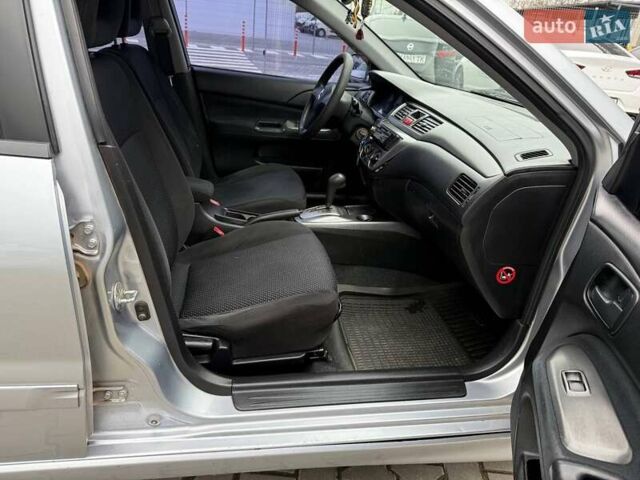 Сірий Міцубісі Lancer, об'ємом двигуна 1.6 л та пробігом 206 тис. км за 4799 $, фото 25 на Automoto.ua