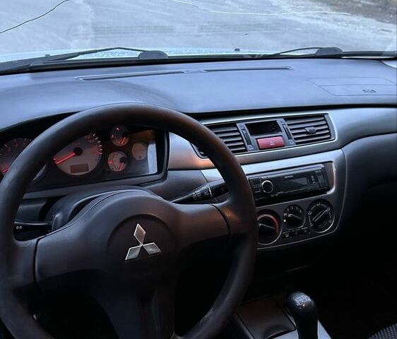 Сірий Міцубісі Lancer, об'ємом двигуна 1.6 л та пробігом 180 тис. км за 3900 $, фото 5 на Automoto.ua
