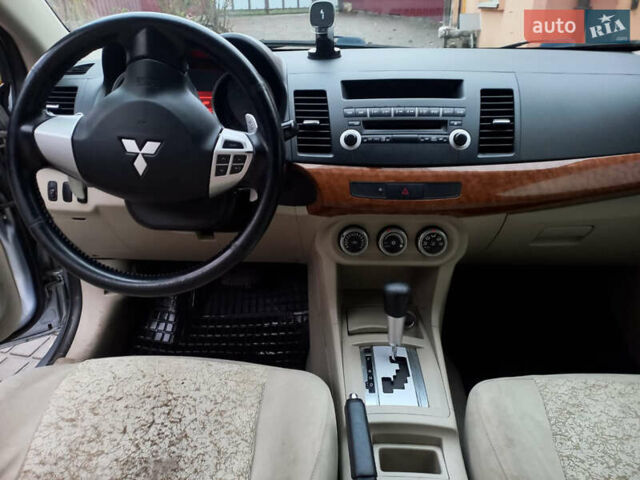 Сірий Міцубісі Lancer, об'ємом двигуна 2 л та пробігом 180 тис. км за 6400 $, фото 4 на Automoto.ua