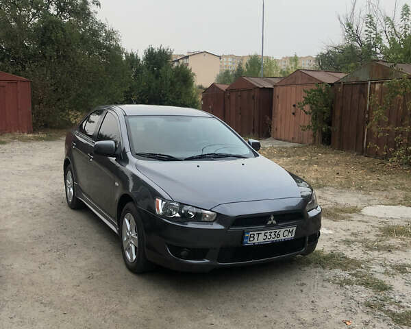 Сірий Міцубісі Lancer, об'ємом двигуна 2 л та пробігом 187 тис. км за 8000 $, фото 2 на Automoto.ua