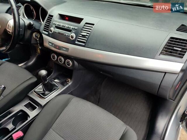 Серый Мицубиси Лансер, объемом двигателя 2 л и пробегом 234 тыс. км за 7200 $, фото 17 на Automoto.ua
