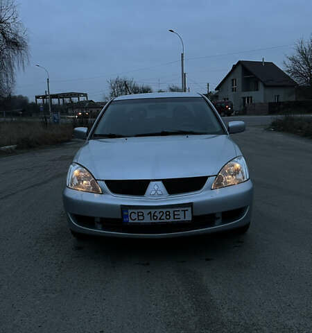 Сірий Міцубісі Lancer, об'ємом двигуна 1.58 л та пробігом 180 тис. км за 3900 $, фото 8 на Automoto.ua