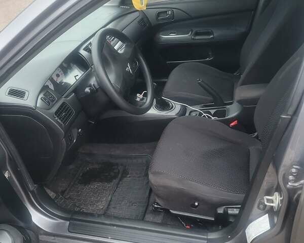 Сірий Міцубісі Lancer, об'ємом двигуна 1.6 л та пробігом 440 тис. км за 4200 $, фото 5 на Automoto.ua