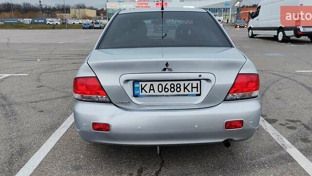 Серый Мицубиси Лансер, объемом двигателя 1.58 л и пробегом 216 тыс. км за 4700 $, фото 13 на Automoto.ua