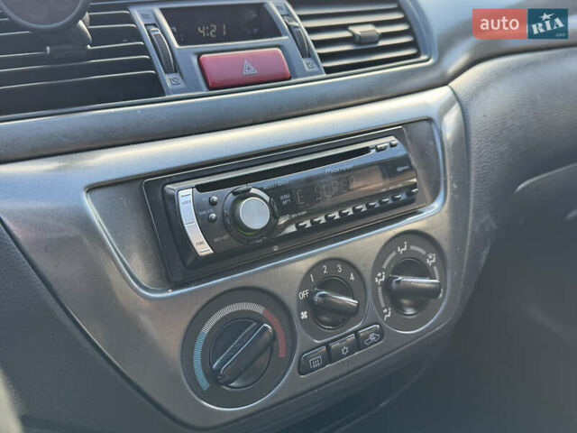 Мицубиси Лансер 2008 в Одессе на Automoto.ua Серый Мицубиси Лансер, объемом двигателя 1.6 л и пробегом 221 тыс. км за 3700 $, фото 16 на Automoto.ua