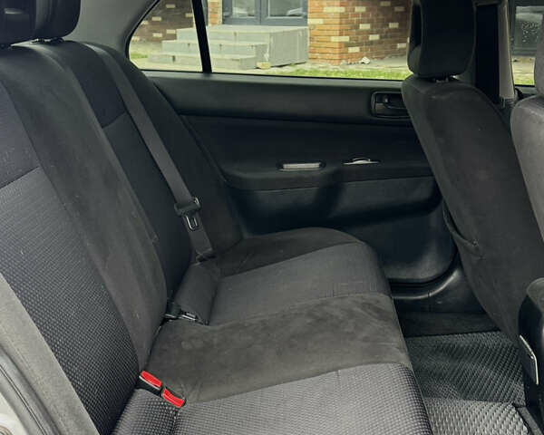 Сірий Міцубісі Lancer, об'ємом двигуна 1.6 л та пробігом 269 тис. км за 3999 $, фото 20 на Automoto.ua