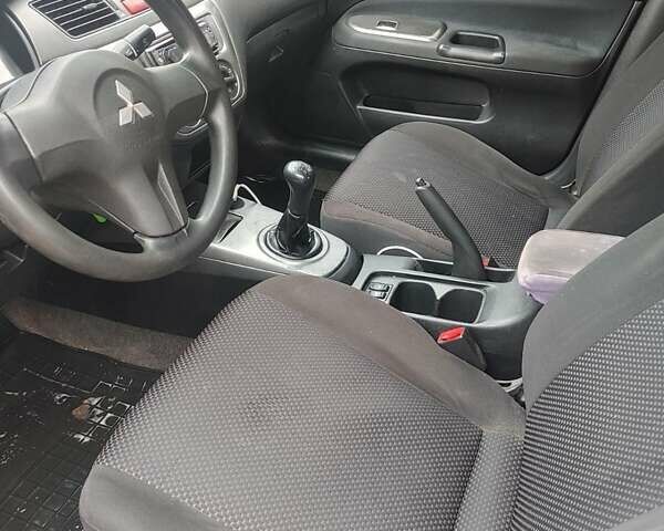 Сірий Міцубісі Lancer, об'ємом двигуна 1.58 л та пробігом 1 тис. км за 2850 $, фото 10 на Automoto.ua